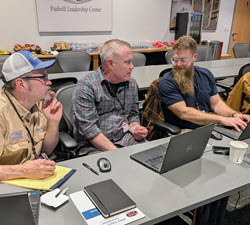 Small group work during the PHCC Essentials of Project Management class March 2026.